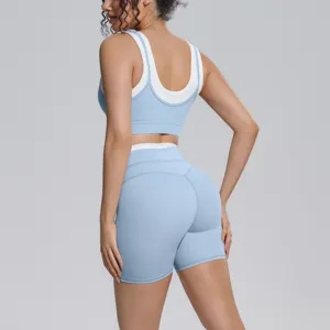 Activewear two piece set sports bra and yoga shorts, colorblock breathable fitness outfit.