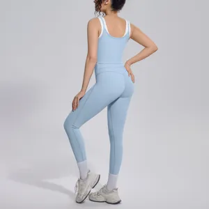 Back view detail of the light blue contrast sports tank top and matching yoga leggings set.