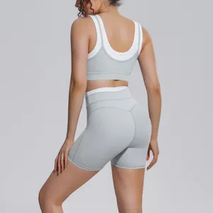 Grey contrast activewear set, breathable nylon fitness backless yoga bra and high waist shorts.