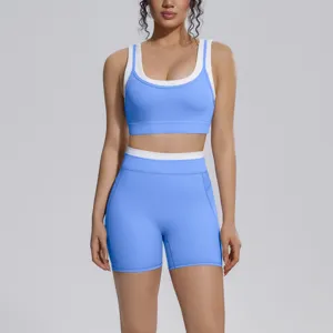 Colorblocked yoga set featuring a stylish athletic sports bra and high-waist fitness shorts for women.