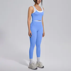 Detailed shot of the blue colorblock athletic sports bra and matching high-waisted yoga leggings.