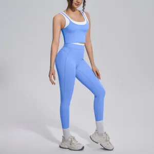 High elastic breathable blue ribbed yoga crop top and matching leggings fitness set detail.