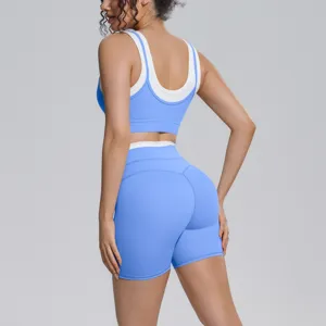 Colorblock nude feel nylon yoga set backless sports bra and fitness shorts detail view.