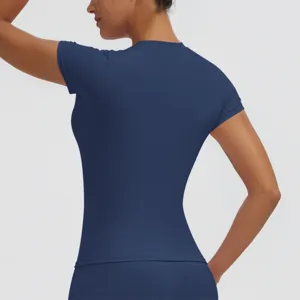 Women's solid blue quick-dry short sleeve yoga top for fitness running activewear.