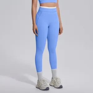 Leggings de yoga taille haute bicolore vue de détail, pantalon moulant de sport pour fitness course.