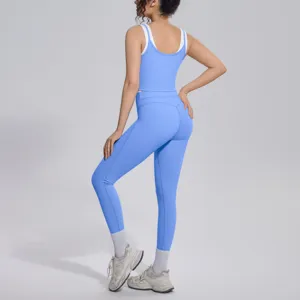 Back view detail of blue activewear yoga set featuring ribbed tank top and high waist leggings.