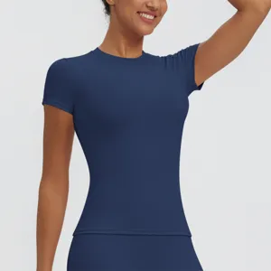 Close-up details of women's dark blue athletic short sleeve slim fit quick dry t-shirt.