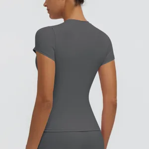Detail view of the dark grey women's slim-fit fitness yoga short sleeve t-shirt back.