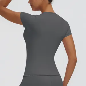 Back detail view of women's dark grey fitness short sleeve yoga top slim fit sportswear