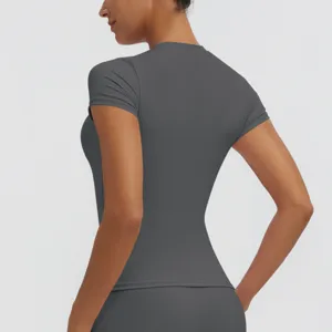 Detailed view of the dark gray short-sleeve sports yoga top showing slim fit and smooth fabric.