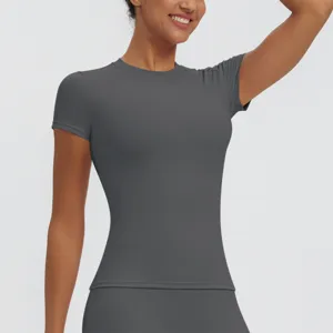 Close-up detail of women's dark gray short-sleeve quick-dry yoga fitness sports top.