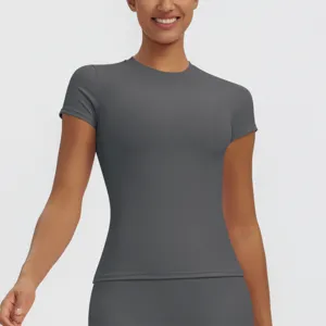 Close-up detail view of women's short sleeve quick-dry slim fit fitness yoga top in dark gray.
