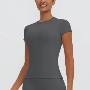 Slim fit short sleeve athletic top detail shot, breathable quick dry fabric for yoga and running fitness.