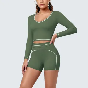 Green long sleeve crop top and shorts activewear set for fitness, running, and yoga workouts.