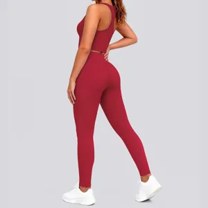 Detail view of the solid red activewear set, featuring a stylish sports bra and matching leggings.