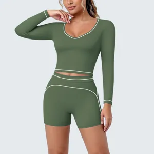Olive green contrast piping long sleeve crop top shorts activewear set yoga gym outfit detail.