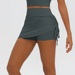 Close-up view of side ruched yoga skort and athletic fitness activewear apparel