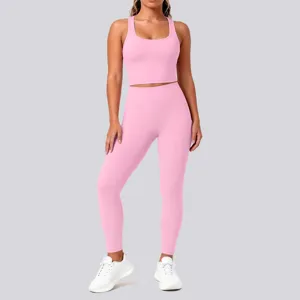 Close-up view of the pink seamless activewear set detail, showing the ribbed texture and fabric.