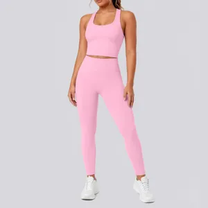 Pink seamless sports bra and high waist yoga leggings detail view for women fitness.