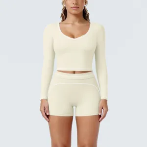 Beige long sleeve activewear set crop top and shorts fitness yoga two piece outfit