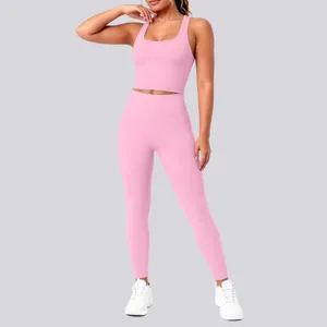 Close-up view of the seamless pink yoga set featuring a supportive crop top and high waist leggings.
