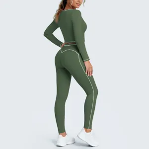 Green long sleeve crop top and leggings yoga set for women gym fitness sportswear detail.