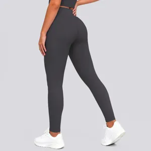 Detail view of high waist butt lifting workout leggings in solid grey color for fitness.