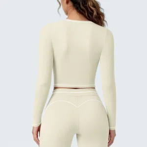Nahtloses Damen Langarm Sport Crop Top und Leggings Set für Fitness Yoga und Laufen.