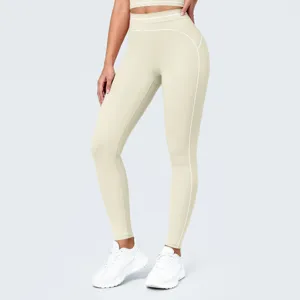 Leggings de yoga sin costuras de talle alto con detalles en contraste para fitness.