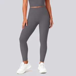 High-waisted seamless gray yoga leggings for women, stretch fitness pants for gym running activewear.