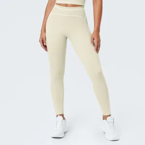 Pantalon de yoga de tiro alto transpirable sin costuras con ribetes para fitness.