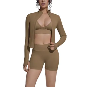 Seamless 3-piece activewear set featuring a long sleeve zip jacket, sports bra, and shorts.