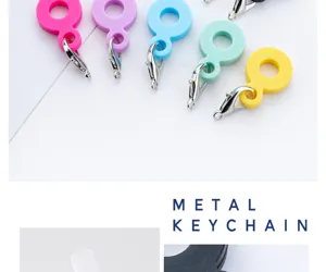 Silicone straw charm close-up detail, colorful ring design with metal clasp for cups.