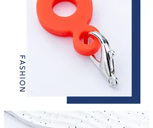 Orange silicone straw charm detail, DIY accessory with metal clasp for 8mm to 10mm cups.