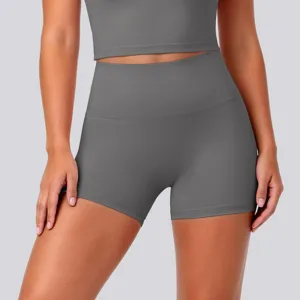 Detail view of women high waist yoga shorts and crop top set, stretchy fitness running gym wear.