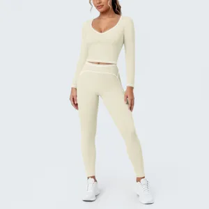 Close-up detail of the contrast piping, soft ribbed fabric, and seamless athletic yoga crop top.