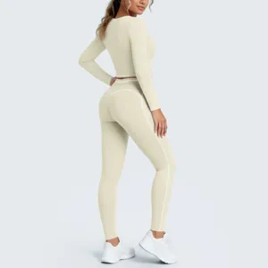 Seamless long sleeve crop top and high waist leggings yoga workout fitness activewear set.