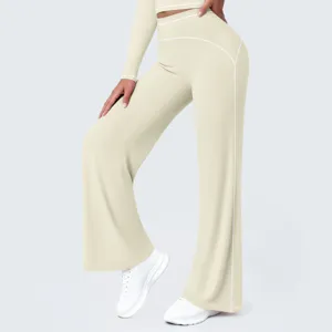 Close-up view of high-waist wide-leg activewear pants featuring elegant contrast piping details.