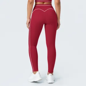 Leggings deportivos de yoga rojos de cintura alta con ribete en contraste para fitness.