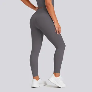 Detail view of high waist push up yoga leggings in dark grey, stretchy fitness activewear.