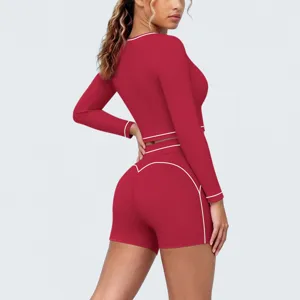 Red contrast color long sleeve crop top and shorts yoga set for women running fitness.