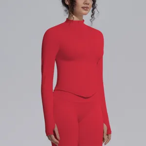Seamless red long sleeve zip sports jacket and yoga leggings activewear workout set detail.