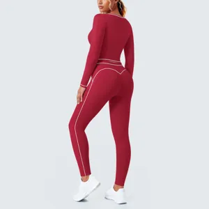 Back view detail shot of the red stretch yoga fitness set featuring stylish white piping.