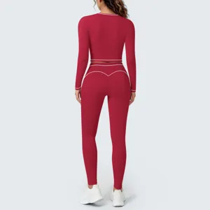 Detail view of the red color-blocked brushed yoga set, featuring stylish piping and comfy fit.