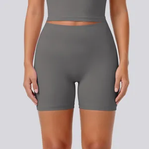 Gray high-waist yoga shorts detail, stretchy breathable activewear fabric for fitness training.