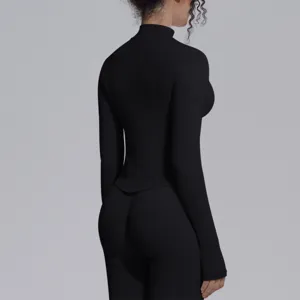 Black long sleeve mock neck yoga top and pants, seamless high elasticity fitness activewear set.