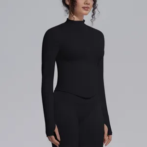 Detailed view of women's black long sleeve athletic zip-up activewear top with thumbholes.