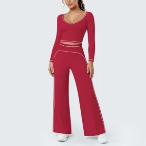 Rotes geripptes Langarm-Crop-Top und weite Yoga-Hose Details mit kontrastierendem Paspelband.