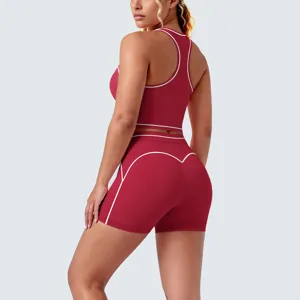 Detailed back view of contrast piped sports bra and high waist yoga shorts activewear set.