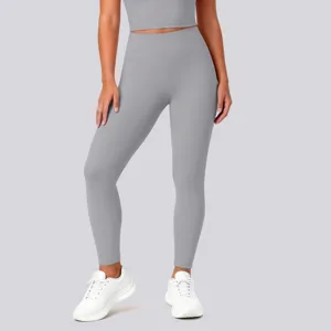 High waist seamless yoga leggings detail shot, stretchy fitness activewear pants for gym running.